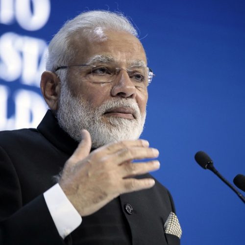 Narendra Modi, India's prime minister, gestures as he speaks during a plenary session on the opening day of the World Economic Forum (WEF) in Davos, Switzerland, on Tuesday, Jan. 23, 2018. World leaders, influential executives, bankers and policy makers attend the 48th annual meeting of the World Economic Forum in Davos from Jan. 23 - 26. Photographer: Jason Alden/Bloomberg